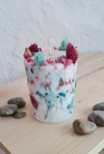 Vela floral artesanal azul y turquesa