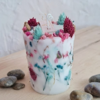 Vela floral artesanal azul y turquesa